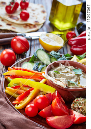 platter with veggiess and baba ganoush dip platter with veggiess and baba ganoush dip 45297067