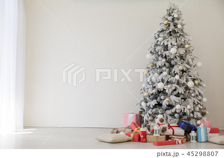 Christmas tree with presents, lights new year winter holidays 45298807