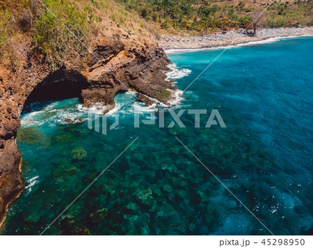 Blue ocean with rocky coast and beach. Aerial view 45298950