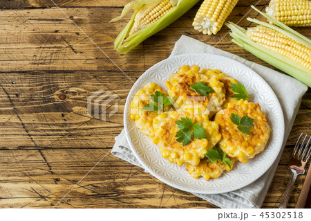 Cutlets from grains of canned corn with parsley  45302518