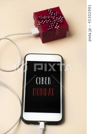 gift and text happy cyber monday in a smartphone 45302991