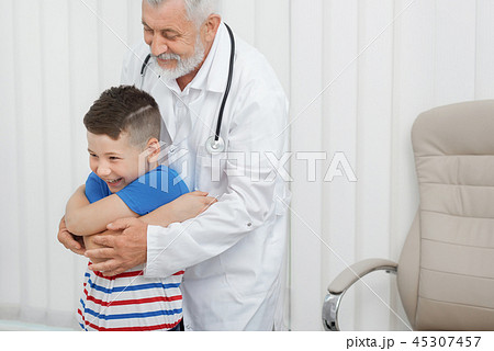 Boy on consultation with doctor in clinic. Boy on consultation with doctor in clinic. 45307457