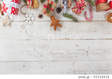 Christmas decoration on wooden background Christmas decoration on wooden background 45310419