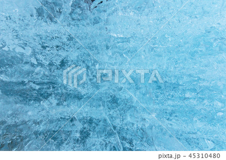 Blue ice texture, winter background, texture of ice surface. 45310480