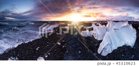 Beautiful sunset over famous Diamond beach, Iceland. Beautiful sunset over famous Diamond beach, Iceland. 45310623