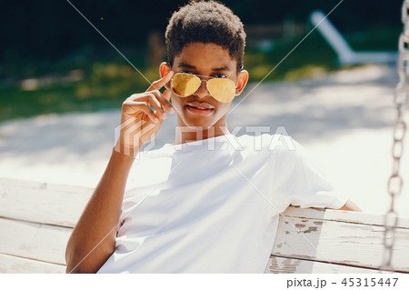 Black guy in a summer park 45315447