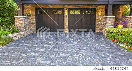 Brick stone driveway double garage doors pano 45316242