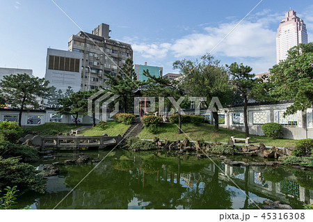 pond and reflection of a pagoda 45316308