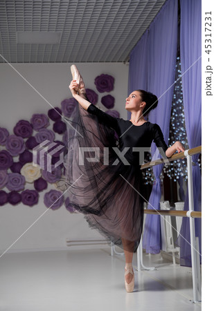 Ballerina in training hall 45317231