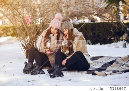 Happy girls in a winter city Happy girls in a winter city 45318947