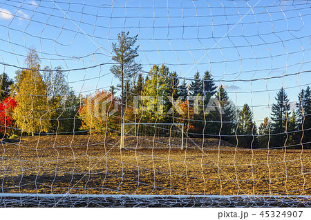 Two old football goals on football field in autumn Two old football goals on football field in autumn 45324907
