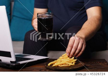 mindless snacking, overeating, laziness, homebody mindless snacking, overeating, laziness, homebody 45326724