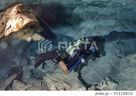 halocline effect while diving in cenotes cave  45328819