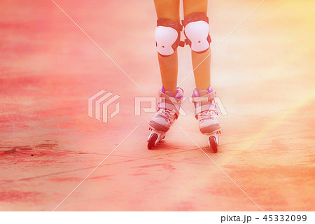 Close up of roller skater girl. Toned image Close up of roller skater girl. Toned image 45332099