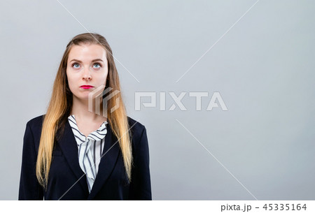 Young woman looking upwards 45335164