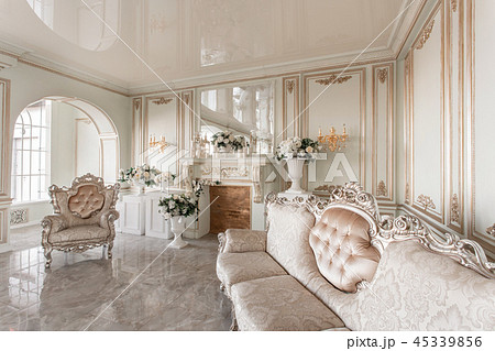 Morning in luxurious light interior in mansion . Bright and clean interior design of a luxury living Morning in luxurious light interior in mansion . Bright and clean interior design of a luxury living 45339856