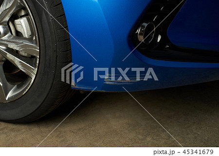 Scratched car bumper 45341679