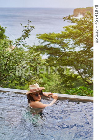 Young woman in pool 45341978