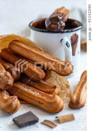 Spanish churros dessert with hot chocolate. Spanish churros dessert with hot chocolate. 45342090