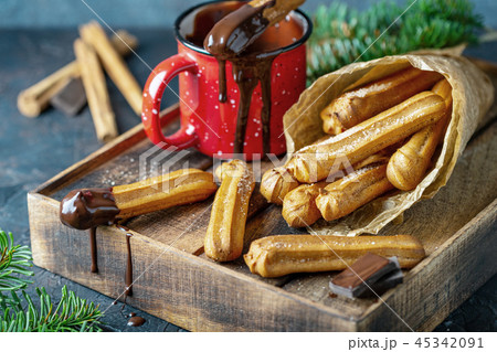 Spanish churros dessert with hot chocolate. Spanish churros dessert with hot chocolate. 45342091