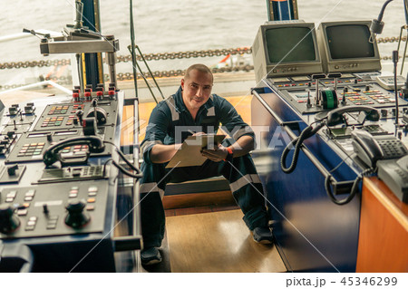Marine navigational officer or chief mate on navigation watch Marine navigational officer or chief mate on navigation watch 45346299