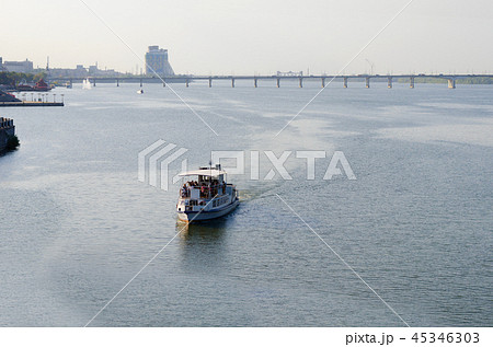 Pleasure boat sailing down the river 45346303