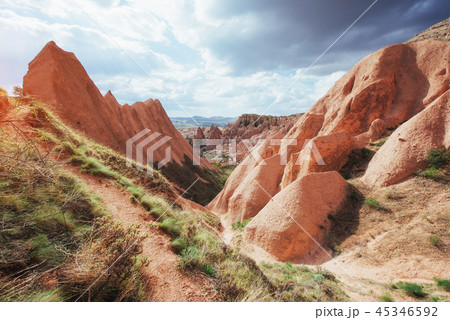 Beautiful Cappadocia on the background of blue sky with white cl 45346592