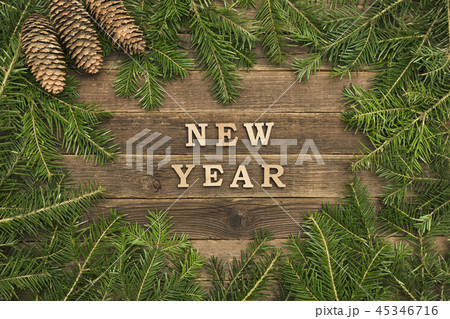 Inscription New Year on a wooden background 45346716