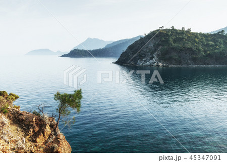 blue sea wave of mediterranean on turkish coast in the eveni blue sea wave of mediterranean on turkish coast in the eveni 45347091