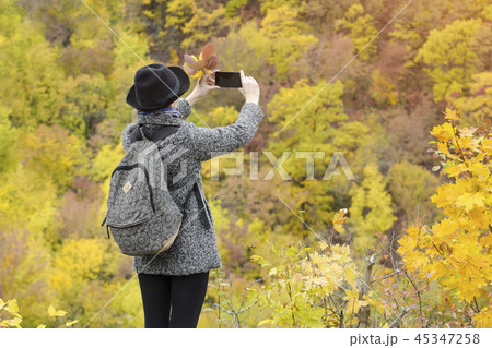 Girl with mobile phone pictures 45347258