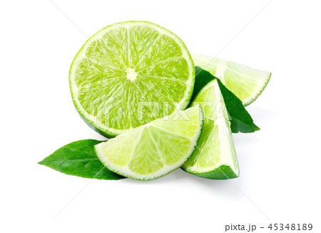Limes with slices and leaves isolated Limes with slices and leaves isolated 45348189