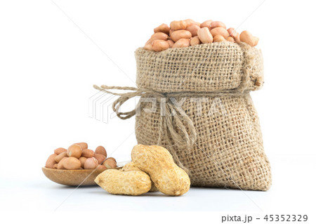 peanuts in burlap sack isolated on white 45352329