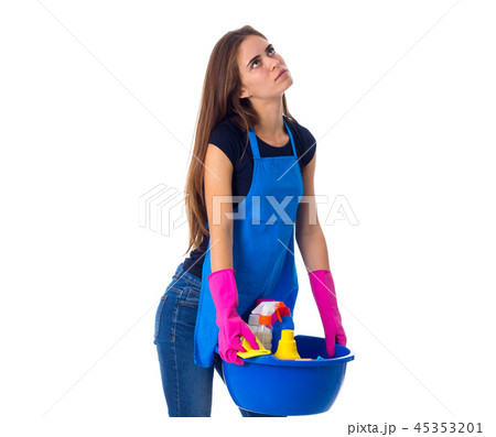 Woman holding cleaning things in washbowl Woman holding cleaning things in washbowl 45353201