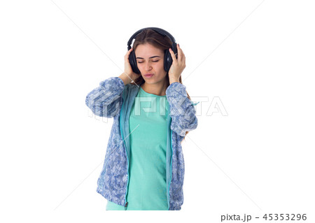 Young woman in headphones Young woman in headphones 45353296