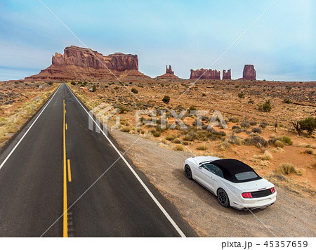 Car parked on the desert asphalt road Car parked on the desert asphalt road 45357659