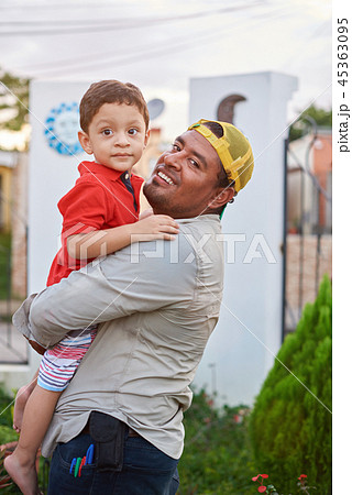 Happy father holding son Happy father holding son 45363095
