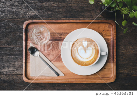 Top view of hot coffee cup with cold water 45363501