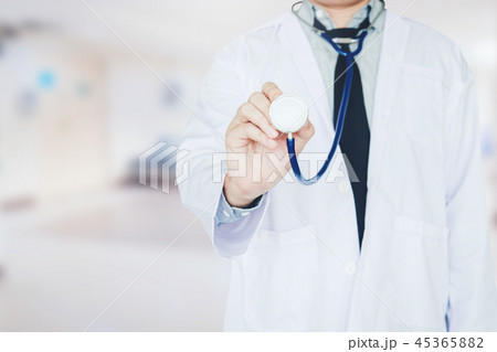 Doctor holding a stethoscope 45365882