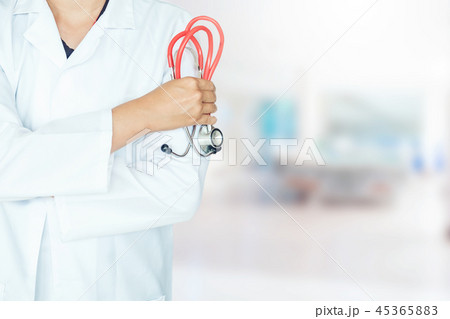 Doctor holding a stethoscope on background of Hosp 45365883