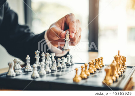 Businessman playing chess game Planning  45365929