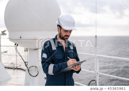 Service technician or serviceman near VSAT terminal 45365961