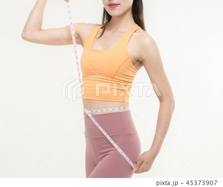 A Korean woman with a waist on a tape measure 45373907