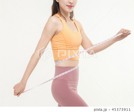 A Korean woman with a waist on a tape measure 45373911