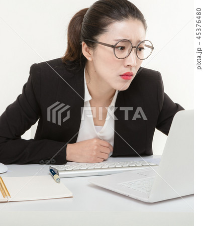 Career woman working in the office 45376480