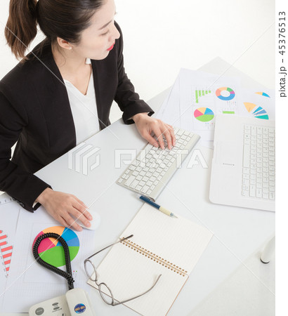 Career woman working in the office 45376513