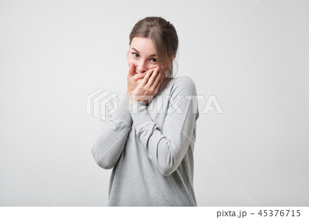 caucasian female being shy 45376715