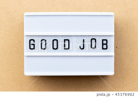 Light box with word good job on wood background Light box with word good job on wood background 45376982