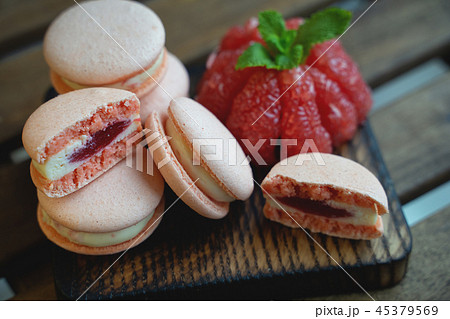 Peanut and chocolate cookies on wooden background in sun rays Peanut and chocolate cookies on wooden background in sun rays 45379569