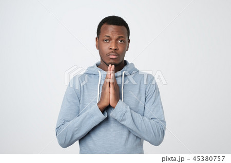 Praying african american man hoping for better. Praying african american man hoping for better. 45380757