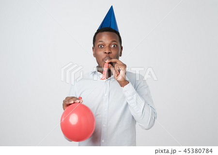Young african man having fun on party Young african man having fun on party 45380784
